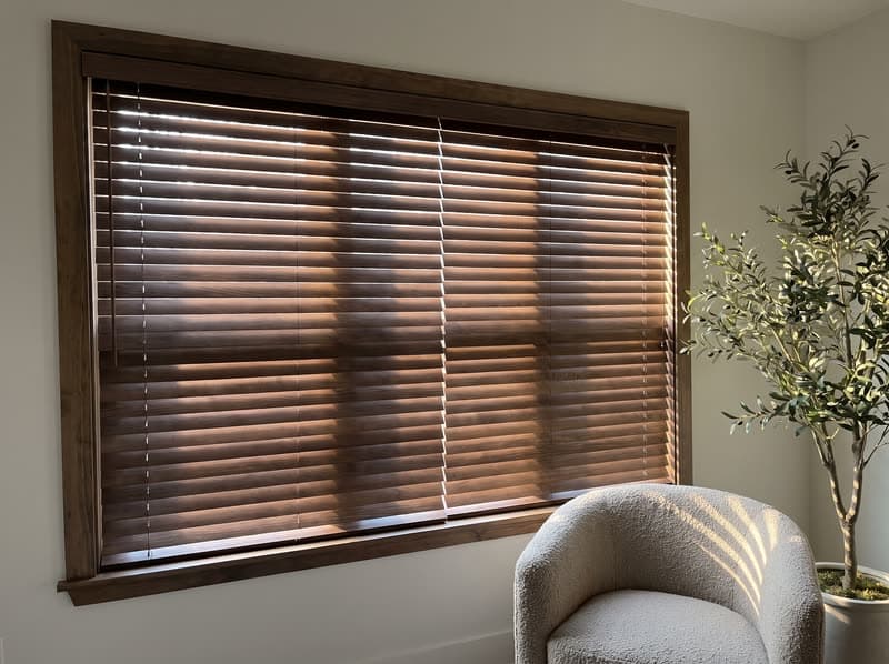 Wood blind on a living room window in a modern farmhouse in Milton