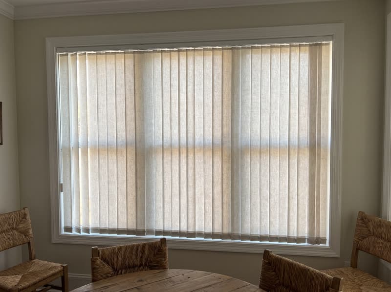 Vertical blind on a breakfast nook window in a modern farmhouse in Canton