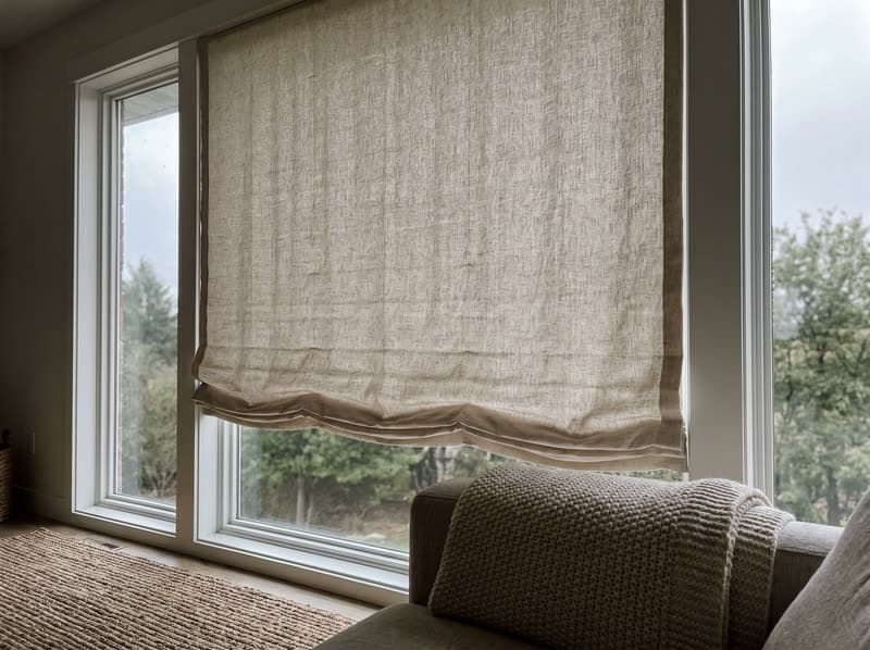 Oatmeal linen roman shade in a Canton living room